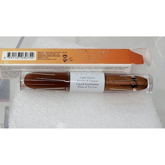 BECCA Other - BECCA Light Gleam Primer & Topper Liquid Eyeshadow .12 fl oz red star